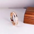 Elegant rose gold eternity ring with princess cut cubic zirconia in a modern channel setting - US 6 / Rose Gold