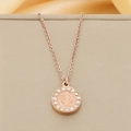 Macro detail of rose gold pendant featuring saint relief and sparkling zircon inlay - Rose Gold Style (KN90142-KFC)