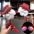 Festive LED glowing Christmas headband featuring cute plush Santa Claus characters - LED Hat Santa