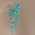 Detail view of blue-green floral earrings featuring layered metal petals and leaves - 14# Silver Pin Metal Lacquer Flower Leaf Long Style Cyan