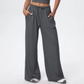 Detail of high-waisted dark grey wide-leg trousers with drawstring and soft drape texture - S / Volcanic Gray