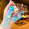 Detail of creative milk tea cup keychain with blue liquid glitter and floating bunny - Blue [milk Tea Cup] Airplane Cloth