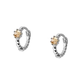 Detail view of silver hoop earrings featuring sparkling orange gemstones and beaded texture - Champagne Silver