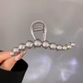 Matte silver ball hair claw clip measuring approx 11cm for elegant hairstyling - Matte Silver Wave