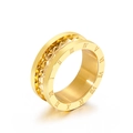 Gold stainless steel ring with Roman numerals and pyramid stud details in 45-degree view - US 7 / Gold (KR92034-GC)