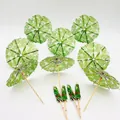 Tropical monstera leaf pattern paper cocktail umbrellas for party and drink decoration - Monstera Leaf Picks