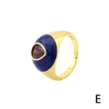 Golden open ring with dark blue enamel surface and central red zircon gemstone - Dark Blue Enamel-Red Teardrop Zirconia