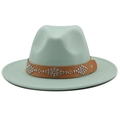 Macro detail of mint green wool fedora hat with brown studded leather decorative band - Mint Green