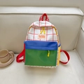 Colorful canvas backpack for kids featuring red plaid pattern and blue front pocket - Green Multi-color