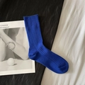 Royal blue ribbed cotton crew socks in minimalist modern flat lay style - Short Klein Blue