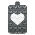 Close-up of heart-shaped silicone suction cup phone holder with matte grey finish - Grey + White