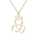 Detailed view of a gold stethoscope pendant necklace for medical professionals - 617 Nurse Figure / Gold
