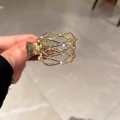 Pince à cheveux étoile dorée avec strass élégants pour fixation de queue de cheval - Pince à cheveux en maille ajourée dorée avec strass