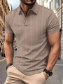 Macro shot of men's polo shirt texture featuring brown herringbone knit and two buttons - Khaki