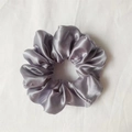 Silver grey satin scrunchie with a silk-like texture and soft metallic luster - Smoke