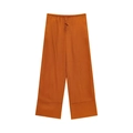 Dettaglio della trama in lino dei pantaloni larghi rosso ruggine con coulisse - Pantaloni Arancioni