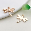 Two golden dragonfly pendant charms for jewelry making shown in front and back view - 1-Piece Pack (17x15mm)
