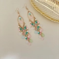 Bohemian tassel earrings in gold with pink, turquoise and white beads for a retro look - Light Multicolor