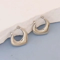 Irregular geometric silver stainless steel hoop earrings on a white stone background - Silver Style K7-21