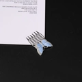 Detail der blauen Marmor-Schmetterling-Haarnadel mit Strasssteinen und Metallkamm - Silber