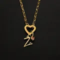 Stainless steel 14K gold initial Z necklace with heart clasp and pink gemstone pendant. - Letter Z