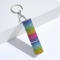 Detailed macro view of the rhinestone gradient refillable perfume bottle keychain - C21-Blue & Pink Gradient