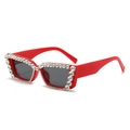 Red square sunglasses with large crystals and dark lenses shown from a 45-degree angle - Red Frame Grey Lens