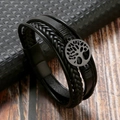Dettaglio del bracciale in pelle intrecciata con ciondolo albero della vita in acciaio - Nero + Nero Opaco