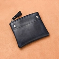 Slim black PU leather coin purse featuring silver rivets and a portable wrist strap - Blue