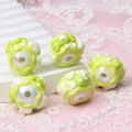 Five green and white hand-painted acrylic flower beads for DIY craft and jewelry making - Green Cream + Strawberry + Candy