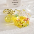 Yellow cat paw liquid quicksand keychain with glowing beads and golden metal ring - Bead Paw Style / Lemon Yellow