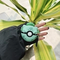 Bulbasaur inspired green silicone case for AirPods with metal hook and leaf detail - Green Poké Ball + Carabiner / AirPods 1/2 Gen