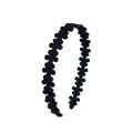 Close-up of black matte acrylic headband with 3D daisy flower embossed texture - 7#Black