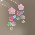 Close-up detail of dangling earrings with colorful cherry blossom resin flower charms - Colorful Flowers Short Tassel Style (HE7406) / 1 Pair Pack / Colorful
