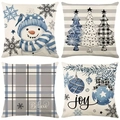 Set of 4 Christmas pillow covers featuring snowmen and holiday patterns in blue and grey - Ice Blue Winter