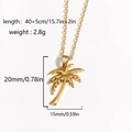 Golden stainless steel coconut tree pendant necklace with dimensions and size markers - Coconut Tree Style 1