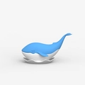 Blue whale shaped silicone soap holder with white wavy base on white background - Whale Tea Infuser