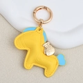 Yellow horse leather keychain with blue mane detail and a gold coin bag charm - Large / Yellow