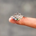 Lotus flower ring with colorful zircon gemstones in silver finish shown on a finger - US 7 / White Gold