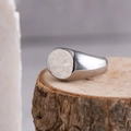 Minimalist wide polished stainless steel ring displayed on a natural wooden stump pedestal - US Size 9 / Silver