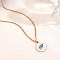 Elegant gold evil eye pendant necklace with white and blue enamel on textured background - Evil Eye Style (BY021)
