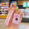 Pink My Melody camera keychain with a golden bell and a Good Luck rubber wrist strap - Glowing Camera-Pink Rabbit