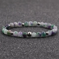 Close-up of 6mm mixed tiger eye and agate beaded bracelet with silver metal spacers - 6MM Multicolored