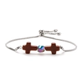 Detail of adjustable silver chain with brown cross stones and iridescent central bead - Gold Sandstone