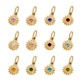 Twelve gold sun-shaped stainless steel pendants with multi-colored gemstones on white background - Set of 12 (Multicolor Sun Pendants)