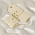 Mini off-white microfiber jewelry travel roll with gold snap button and earring holes - 14×6cm / Off White