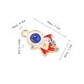 Colorful enamel astronaut charm in gold finish with precise size measurements - Flying Astronaut