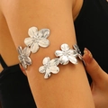 Silver flower upper arm cuff bracelet featuring textured floral design in metallic finish - Silver Flower Upper Arm Cuff
