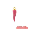 Detailed view of pink enamel chili pendant measuring 5mm by 17.5mm with gold ring - VD1480 Gold Pink Enamel Chili