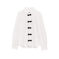 Elegante witte kanten blouse met lange mouwen en decoratieve zwarte strikken op de voorkant - XS / Wit